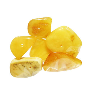 Polished Medium Butterscotch uneven Baltic Amber Beads with holes. Natural and untreated Baltic Amber beads.