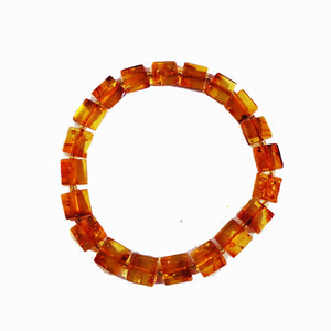 Baltic Amber Square Bracelets. One elastic strings expand to fit all wrists. Comes with lovely gift boxes. available in 5 colours