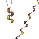 Elegant and dazzling sterling silver 925 fittings and small multicolour baltic amber slices bracelet.