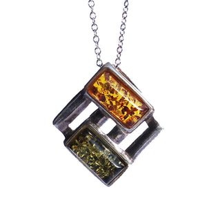 Modern sterling silver 925 square fittings and rectangular baltic amber pieces used to make this pendant.