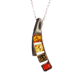 Modern sterling silver 925 fittings and four small square multicolour baltic amber pieces used to make this pendant