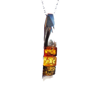 Modern sterling silver 925 fittings and three small square multicolour baltic amber pieces used to make this pendant