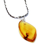 Capture The Warmth Of Amber With This Lemon Amber Pendant With Inclusion