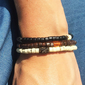 Minimalist Amber and black/cream/brown wooden beads Bracelet. One elastic strings expand to fit all wrists. Amber Jewellery