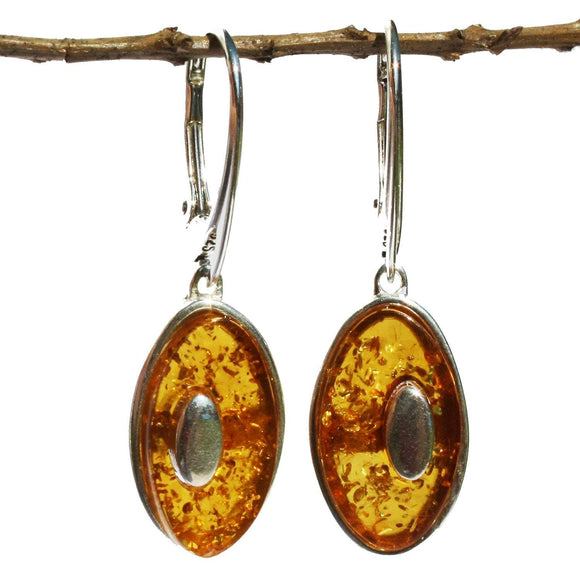 Individually crafted oval portions of honey or cherry amber have been set onto sterling silver to create these spectacular drop earrings.