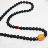 Unpolished black cherry and unpolished butterscotch amber bead Necklace.